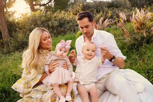 Paris Hilton poses for a picture with her family.